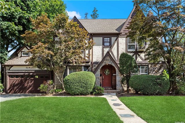  3 BR,  3.00 BTH  Tudor style home in Garden City